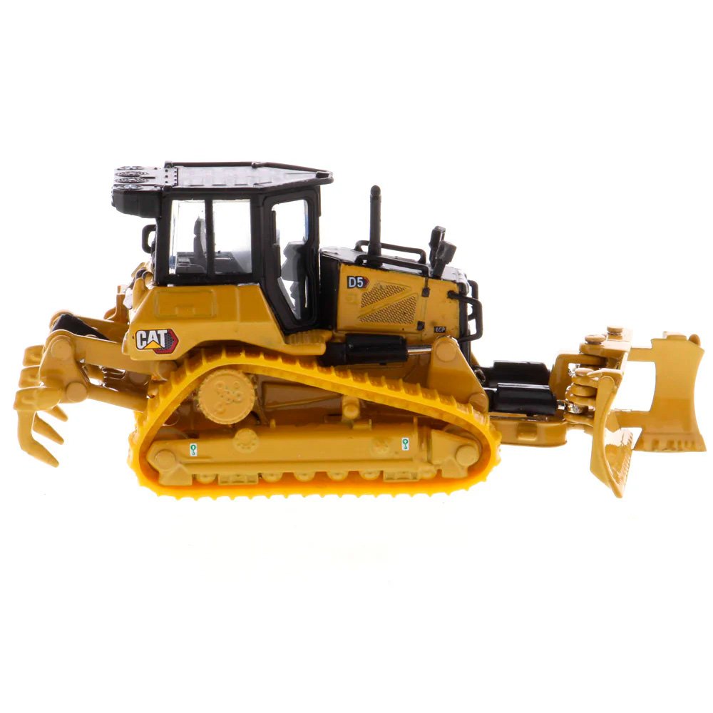85953 Miniatura Trator de esteiras Cat D5 na escala 1:87 com esteiras para nivelamento fino e lâmina dobrável. - Imagem 2